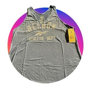 Women’s Reebok supremium tranning color is light baby blue size M